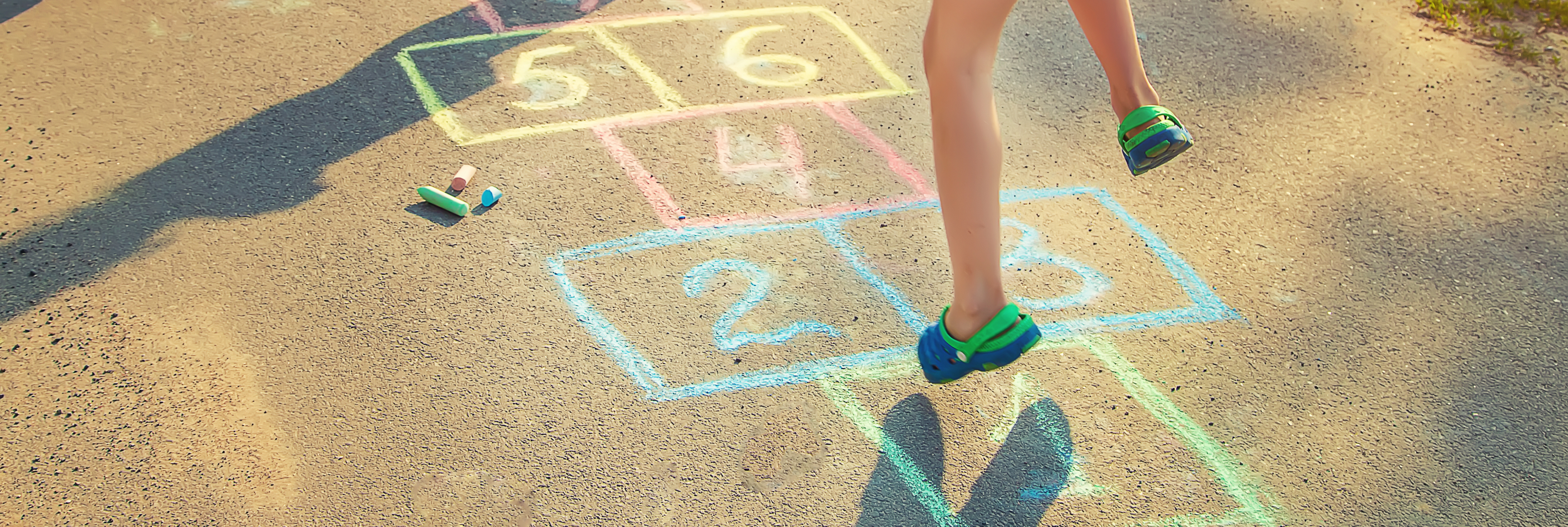 A child playing hopscotch